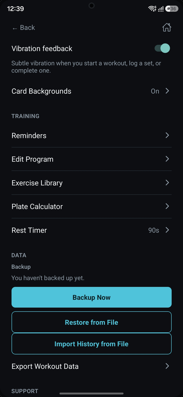 Settings screen with rest timer, backups, and export options